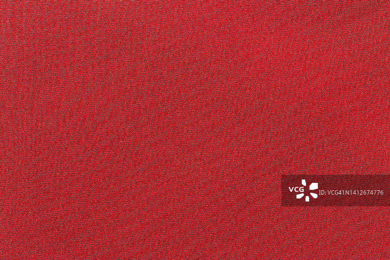 红色布布涤纶纹理和纺织背景。图片素材