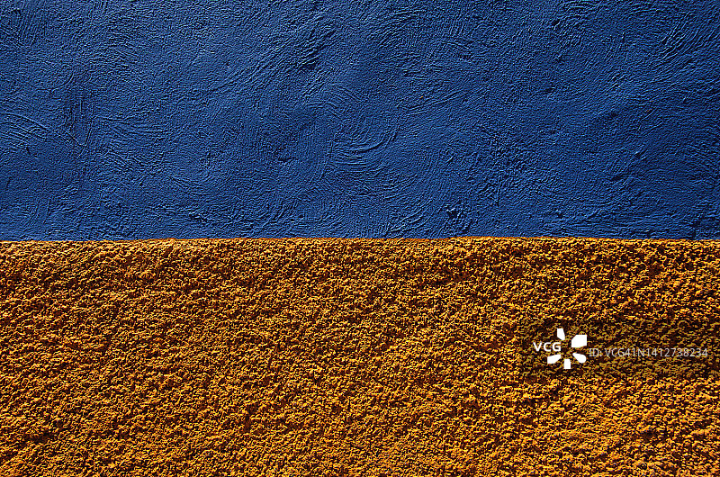 殖民时期建筑外部蓝橙色灰泥墙图片素材