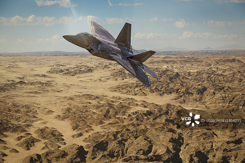军用飞机飞越沙漠图片素材
