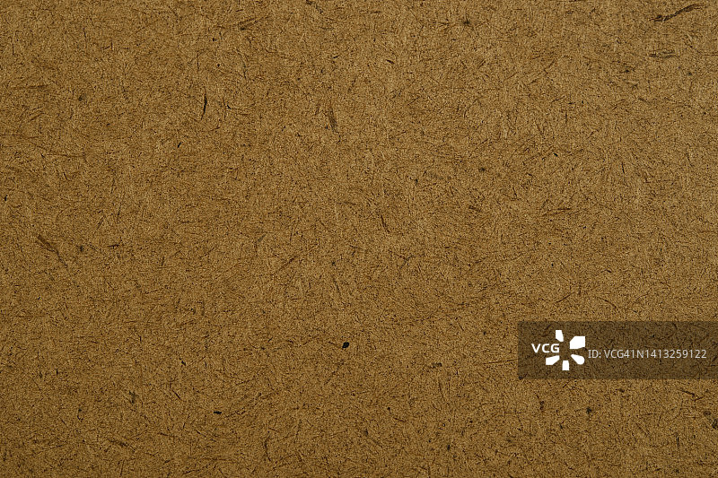 棕色纸张质地的纸板背景。图片素材