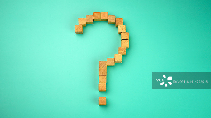 蓝色背景木块上的问号图片素材