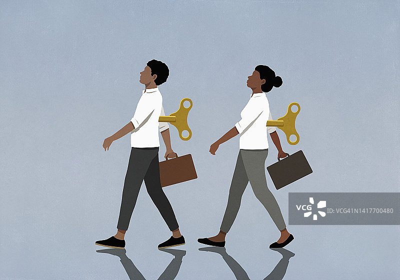 拿着公文包行走的上发条的商务人士图片素材