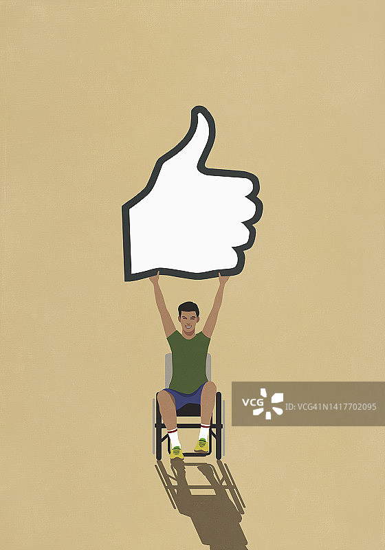 坐在轮椅上的男士手持社交媒体点赞按钮图片素材