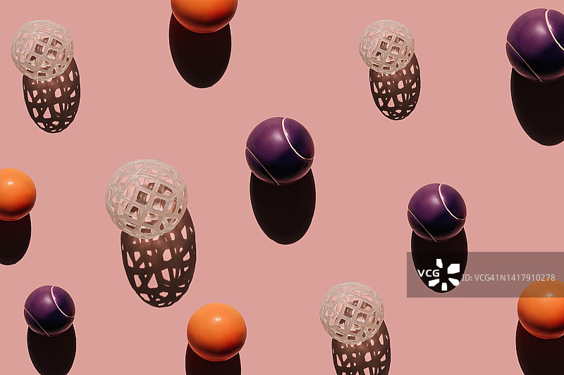 粉色背景上的不同运动球图片素材