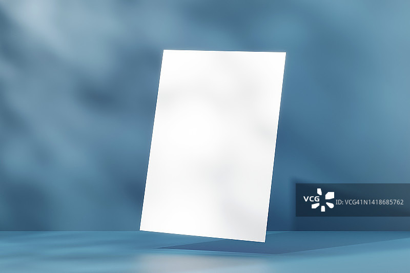 蓝色背景上漂浮的白色A4纸图片素材