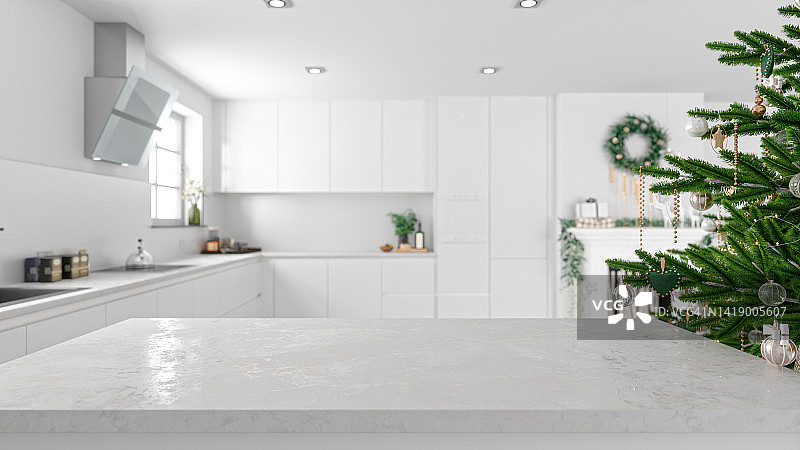 带圣诞装饰的现代厨房大理石桌子图片素材