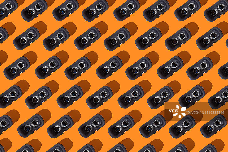 VR眼镜内部结构图案，橙色背景图片素材
