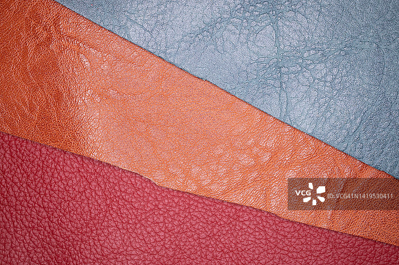 灰色、橙色和红色皮革封面图片素材