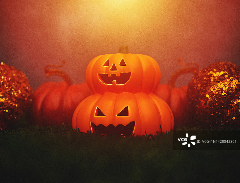 万圣节背景：南瓜灯与日落图片素材
