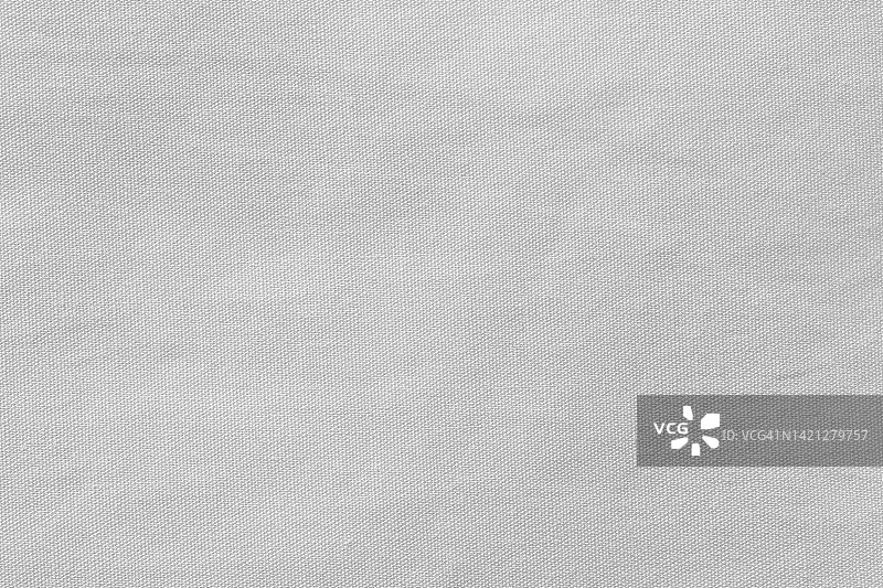 白色布布涤纶纹理和纺织品背景。图片素材
