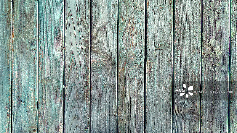 法国巴黎木板墙上做旧的绿色油漆图片素材