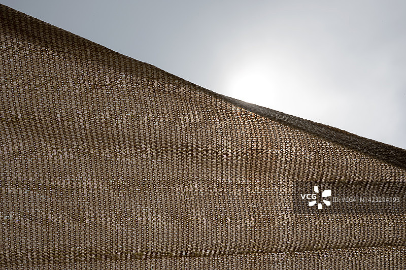 阳光穿过遮阳网图片素材