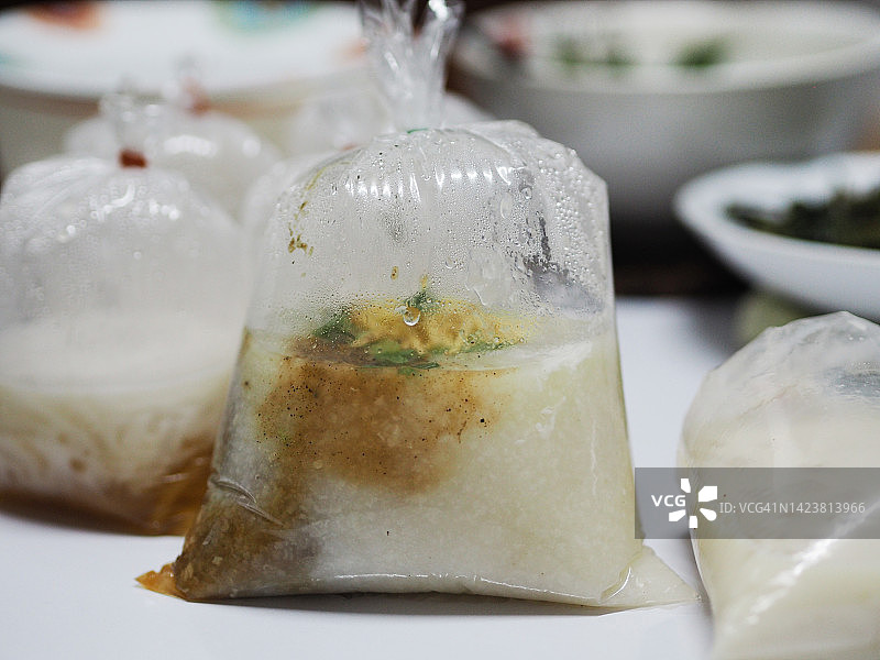 塑料袋装猪肉粥图片素材