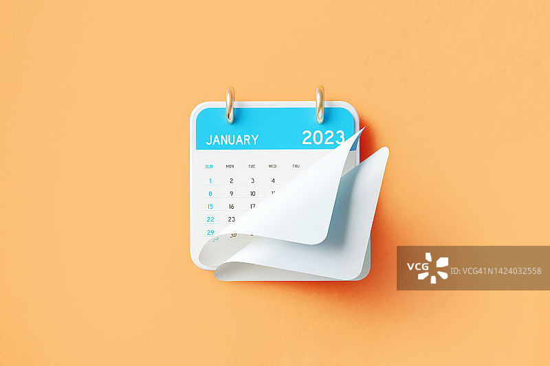 橙色背景上的2023年1月日历图片素材