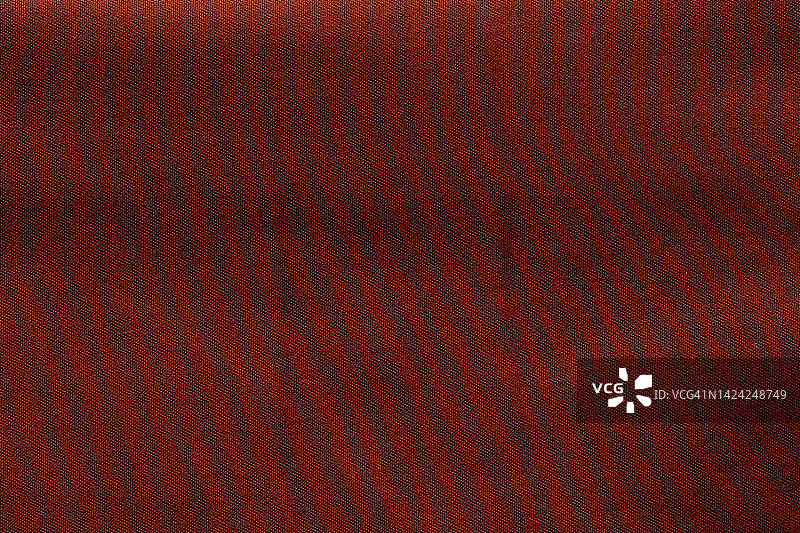 红色面料面料涤纶面料质地和纺织背景。图片素材