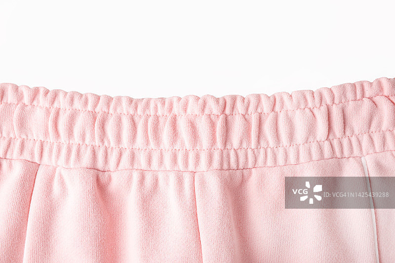 运动裤上的腰带。粉色裤子的弹性腰带图片素材