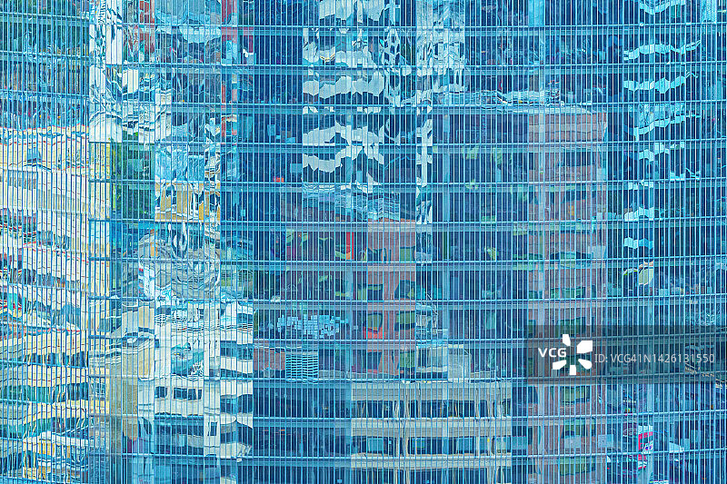 蓝色玻璃窗办公楼图片素材