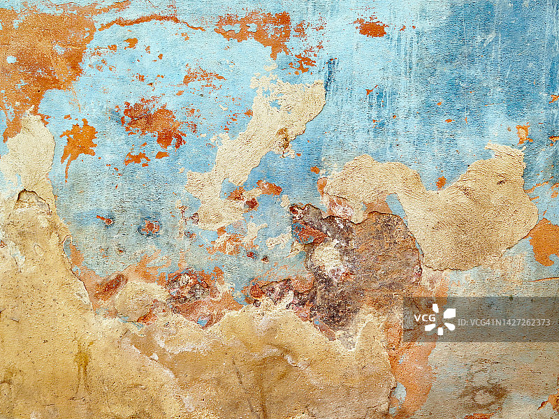 古巴哈瓦那纹理混凝土墙上风化刮擦的蓝棕色油漆图片素材