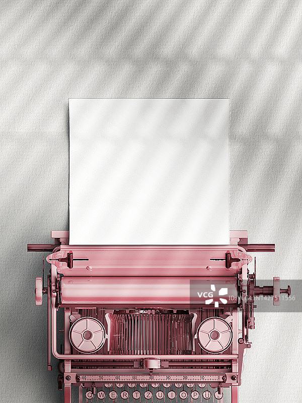 70年代打字机俯视图，带空白纸张（灰色背景）图片素材