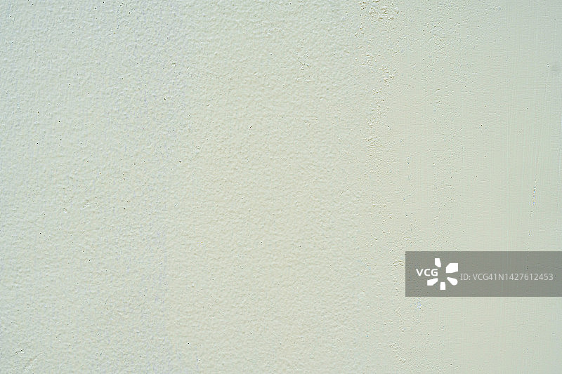 乳白色旧水泥墙纹理和背景图片素材