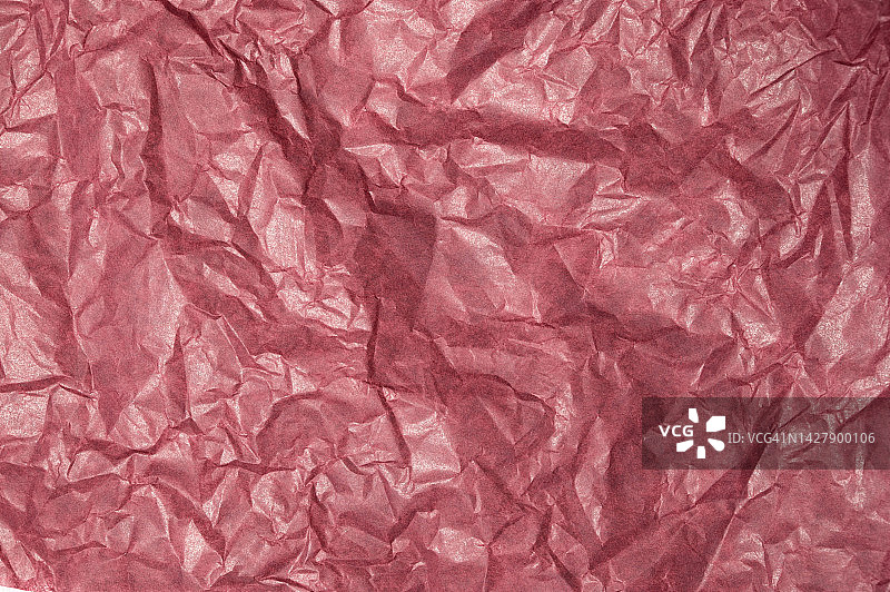 红色皱纹纸或纸张纹理图案背景，抽象纸背景图片素材