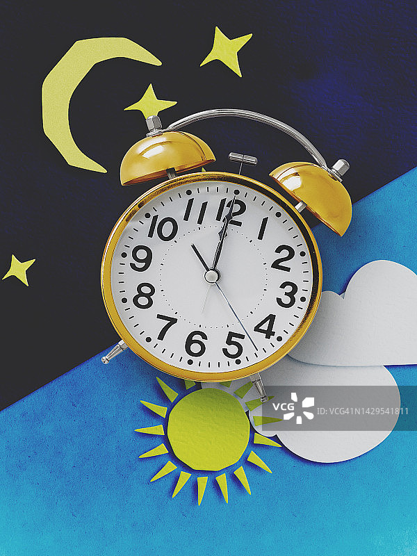 昼夜概念：带闹钟的昼夜节律图片素材