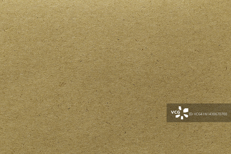 棕色纸片质地硬纸板背景。图片素材
