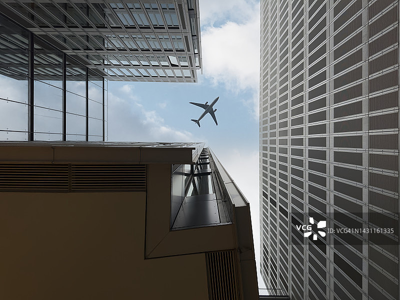 飞机飞越中国杭州商业区现代建筑图片素材