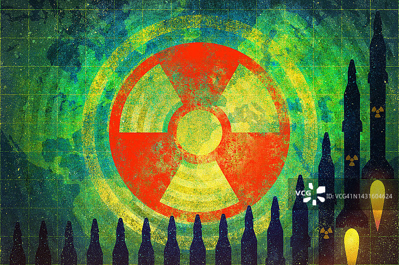 带有放射性标志和世界地图背景的核导弹图片素材