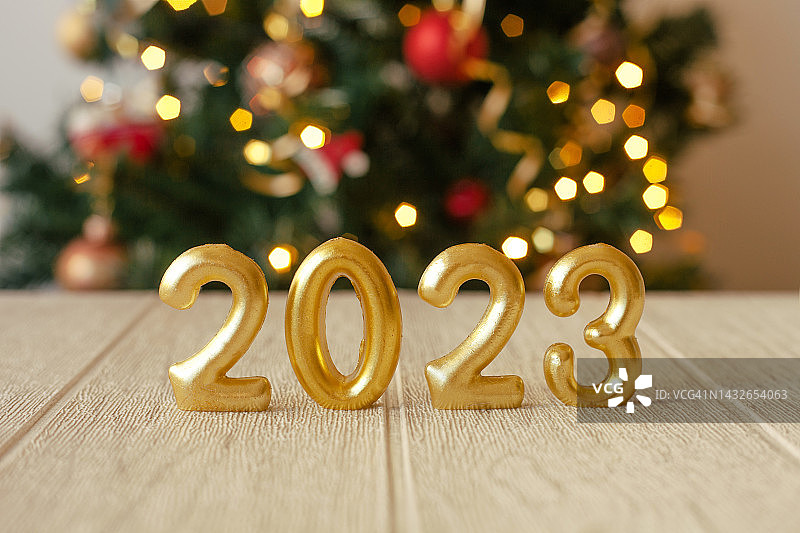 2023新年标志，背景虚化灯光图片素材