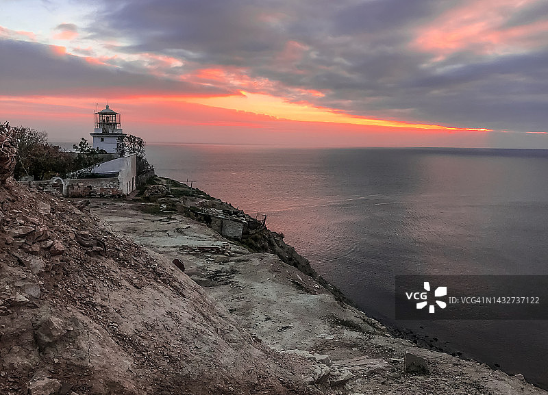 日出海景灯塔建筑图片素材