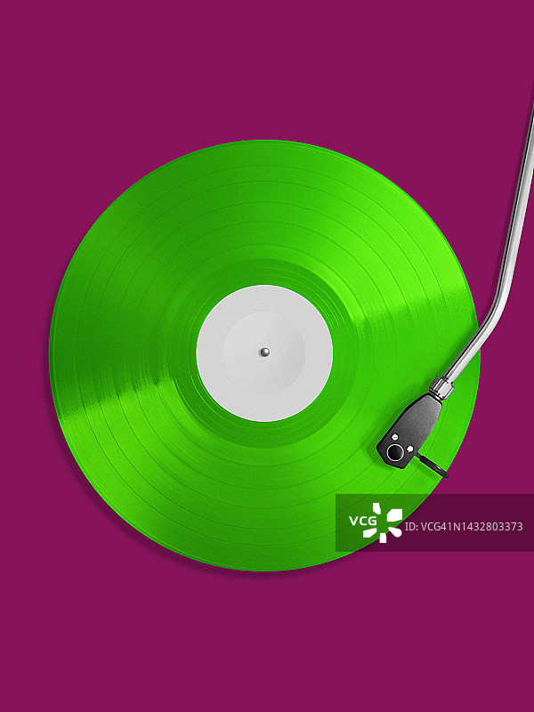 绿色12英寸黑胶唱片的俯视图图片素材