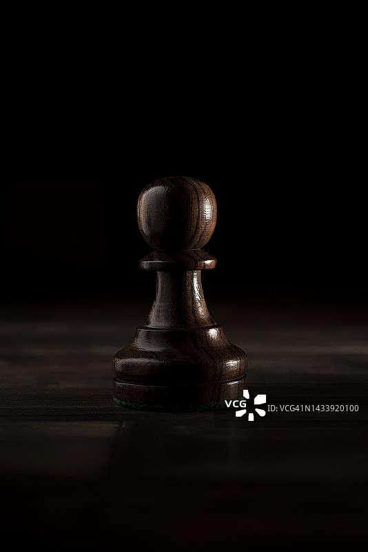 黑色国际象棋棋子的戏剧性特写图片素材