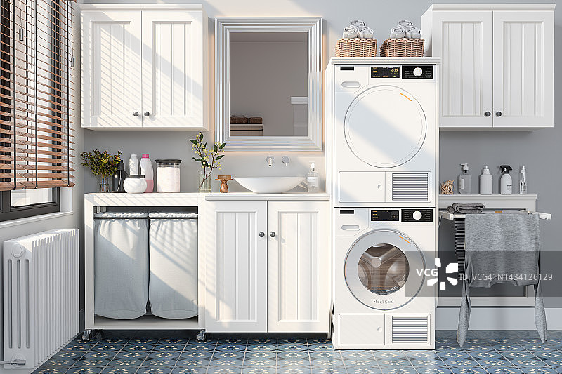 带洗衣机、烘干机和白色橱柜的现代浴室图片素材