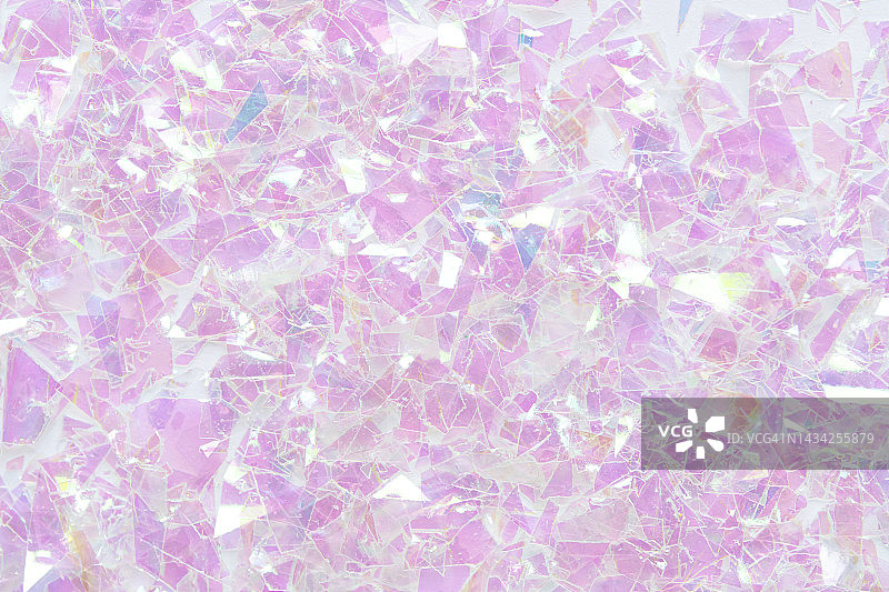 节日抽象粉色闪光背景。新年和圣诞节庆典概念。明亮背景，带有文案空间。它也可以是完美的生日背景图片素材