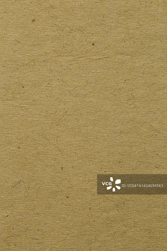 棕色纸片质地硬纸板背景。图片素材