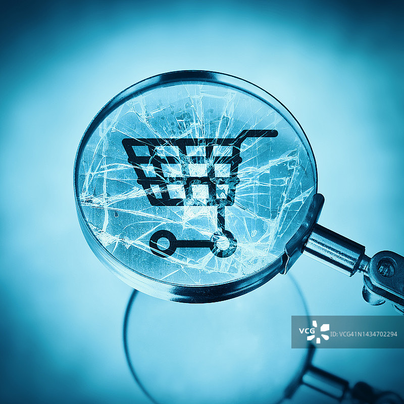 破碎的放大镜购物手推车图片素材