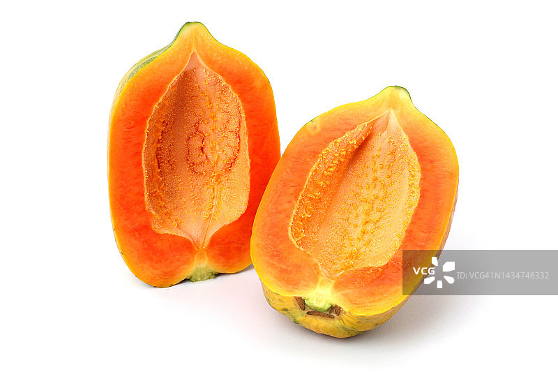 白色背景上的木瓜切半图片素材
