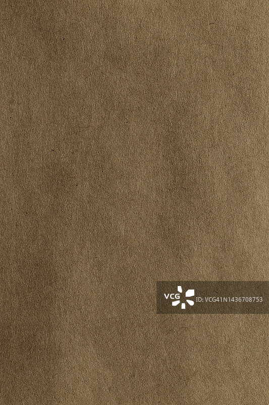 棕色纸片质地硬纸板背景。图片素材