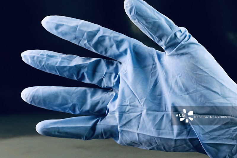 人手上的一次性手术手套图片素材