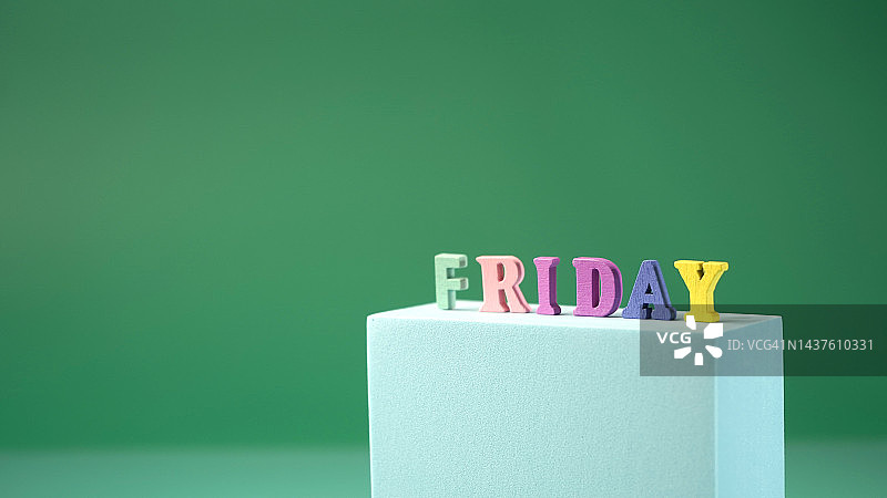 讲台上带有复制空间的星期五字块图片素材