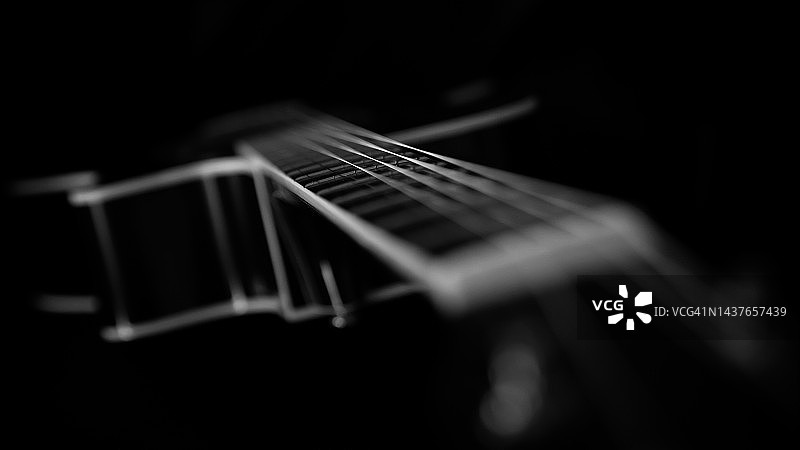 从琴颈到琴体的原声吉他抽象视图图片素材