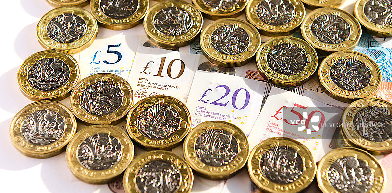 英镑纸币和英镑硬币图片素材