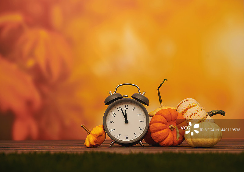 秋季时钟与南瓜背景图片素材