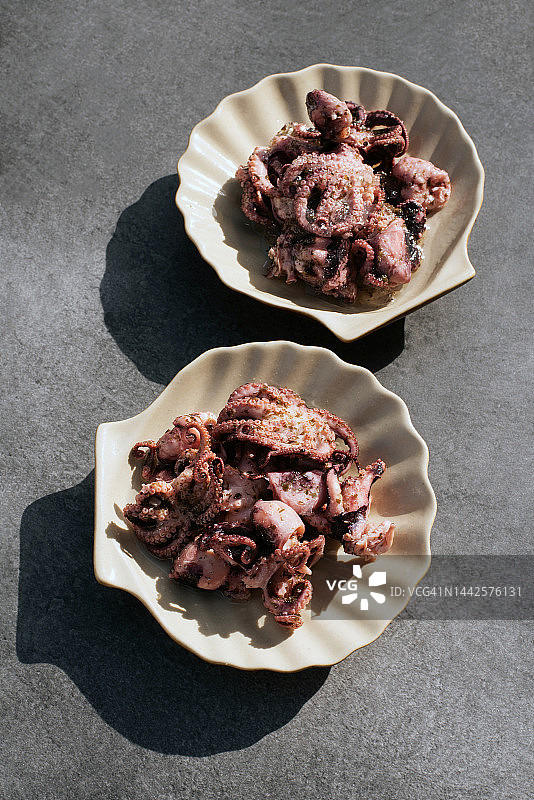 小章鱼熟食，腌制章鱼小吃，海鲜食品图片素材