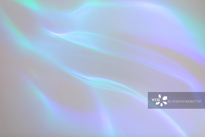 白色墙壁上超现实的光环彩虹激光折射纹理叠加效果图片素材