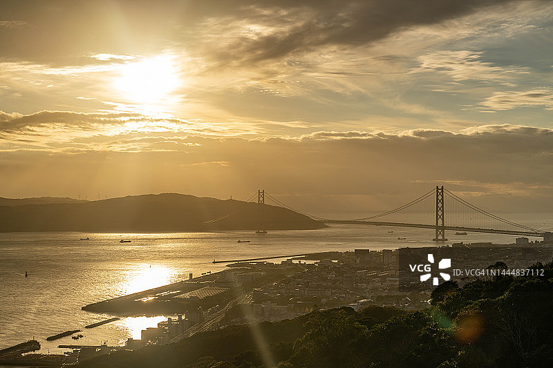 日本神户市海滩日落光束图片素材