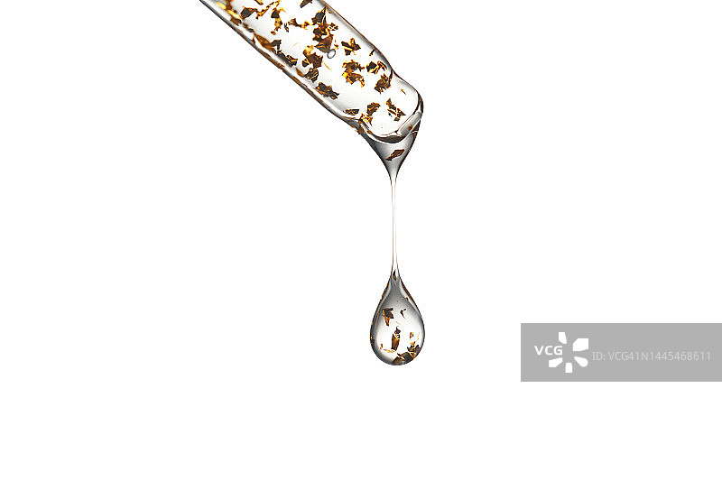 白色背景上带有金色颗粒的血清移液器图片素材