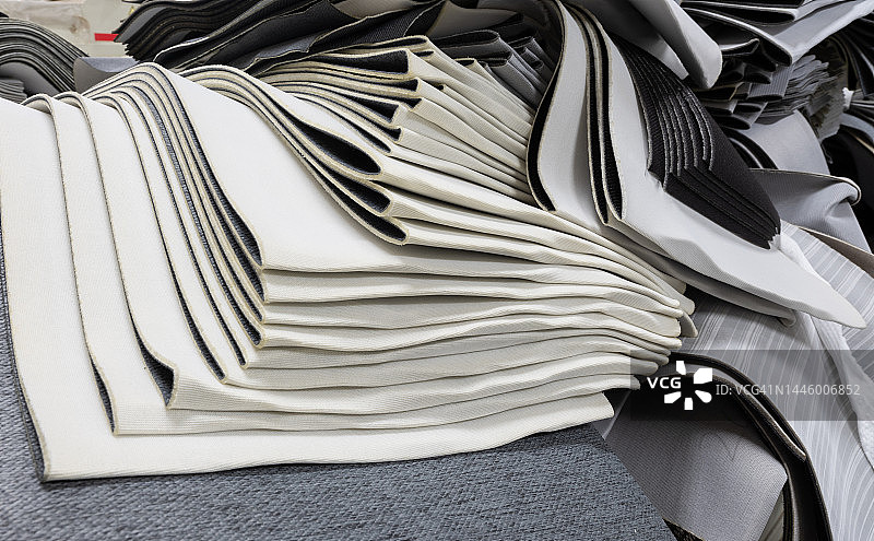 多层堆叠的织物堆纹理图片素材