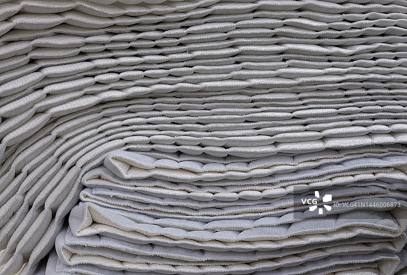 多层堆叠的织物堆纹理图片素材